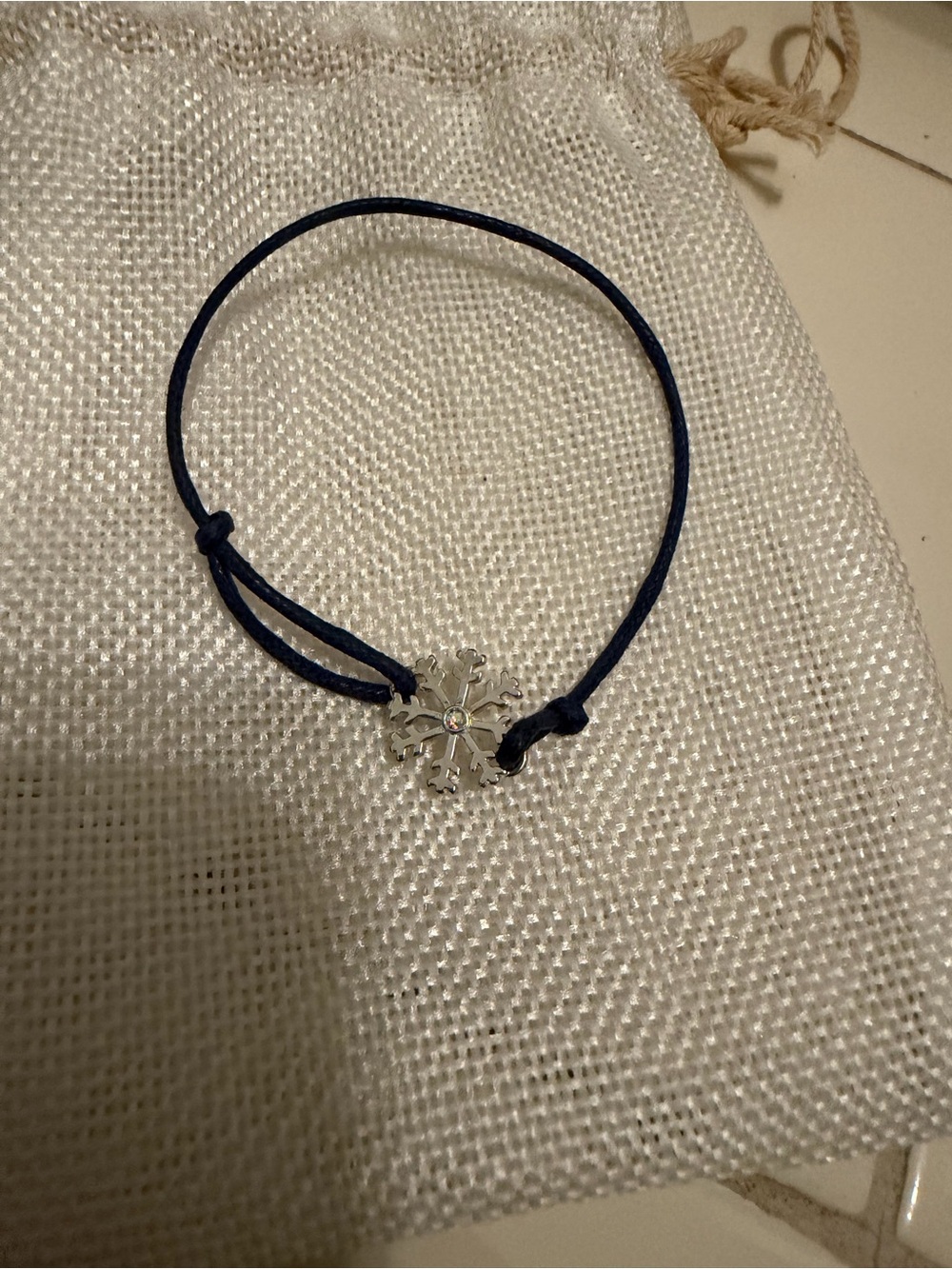 Silver Snowflake and Snowman Charm Bracelet on Cord